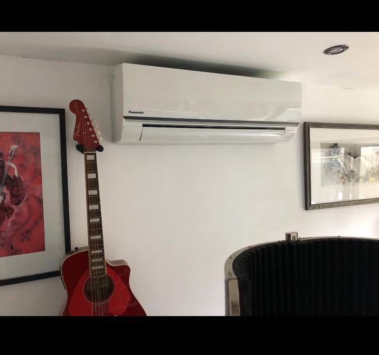 Domestic air conditioning wall unit installation — homes and residential